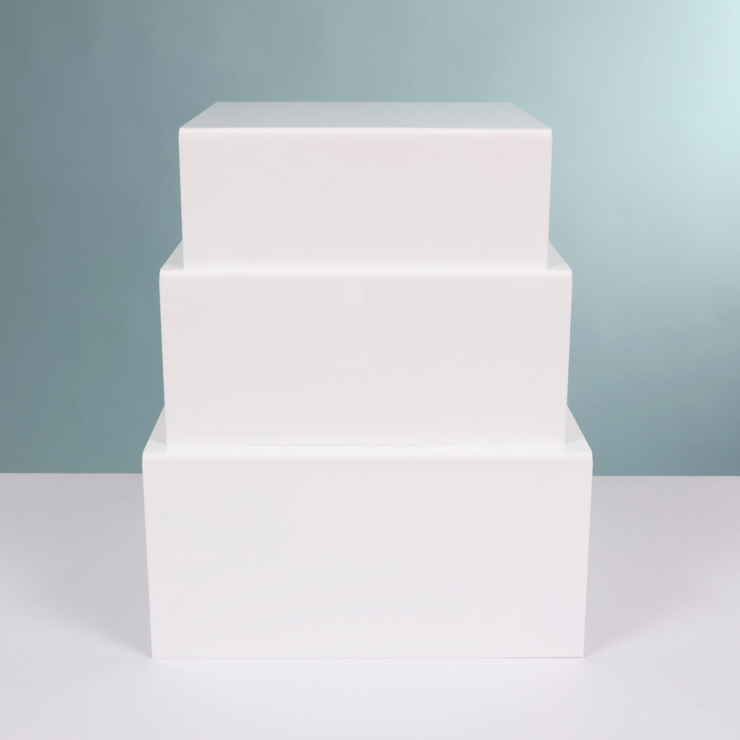 Acrylic Cube Table Riser Set - White (3pc) piled b