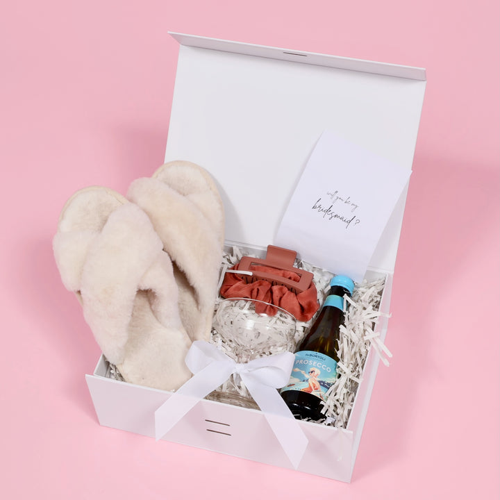 Gift box used as bridesmaid proposal box with slippers, wine, coupe and scrunchy