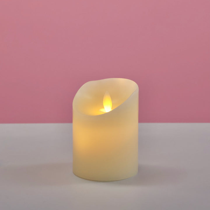 LED Flameless Flickering Wax Pillar Candle - Ivory (7.5x10cm), turned on