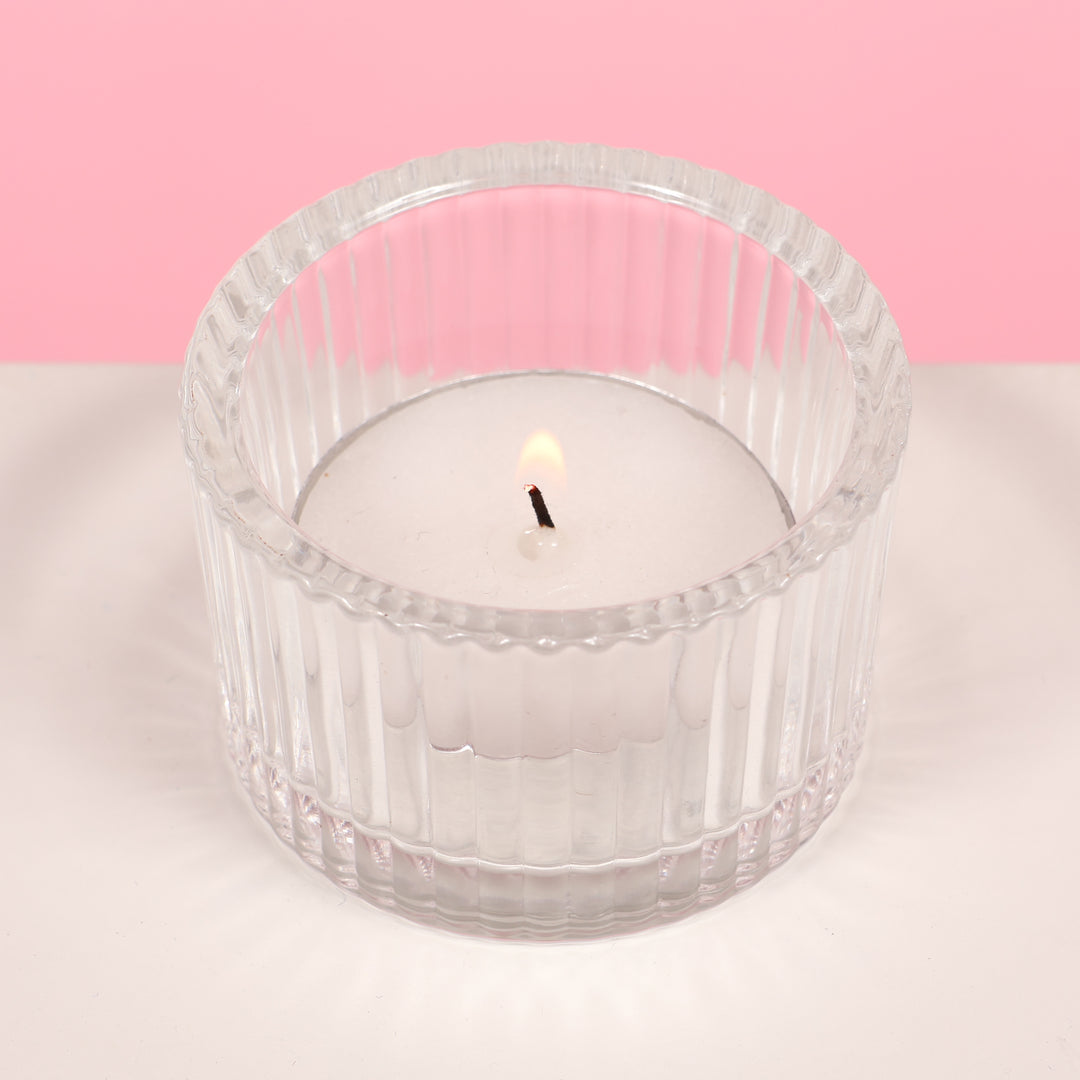 Ribbed Glass Tea Light Candle Holder with candle (top view)