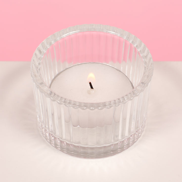 Ribbed Glass Tea Light Candle Holder with candle (top view)
