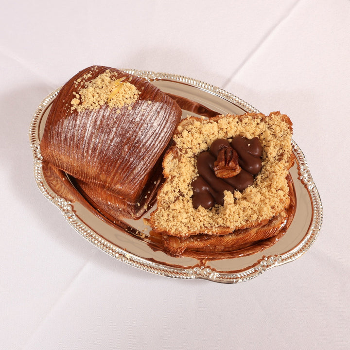 Two pastries on silver antique style tray