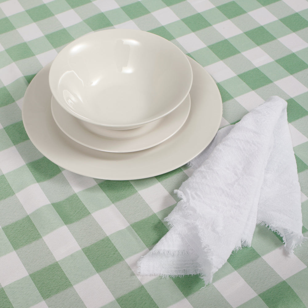Green Checkered Tablecloth (153x259cm) close up with plates and napkin