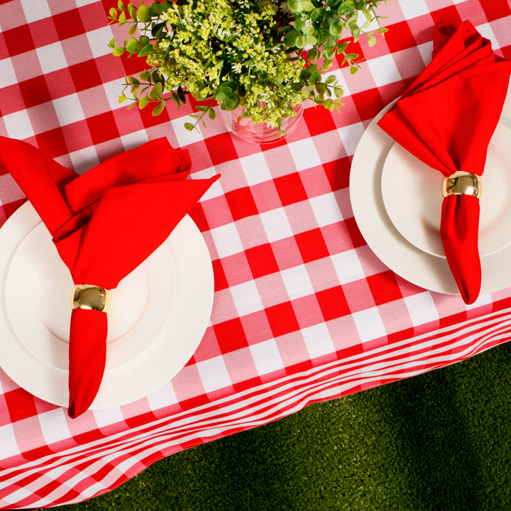 Red Checkered Tablecloth (153x259cm) close up with plates, napkins and flowers