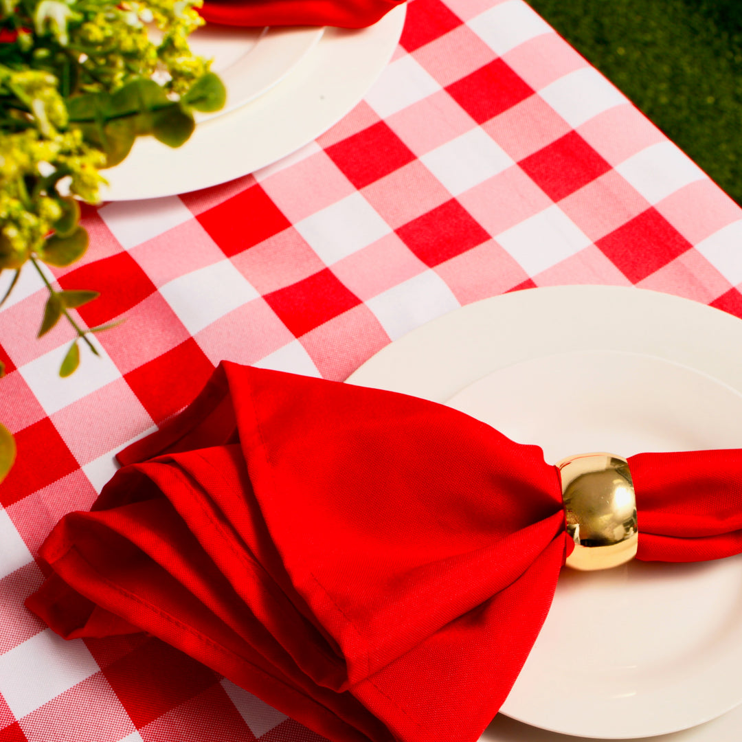 Red Checkered Tablecloth (153x259cm) close up with plates, napkins and flowers