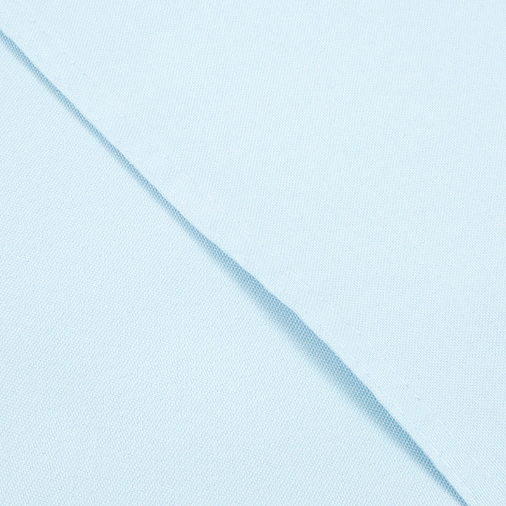 Light Blue Rectangle Tablecloth (153x259cm), close up of hemmed edge