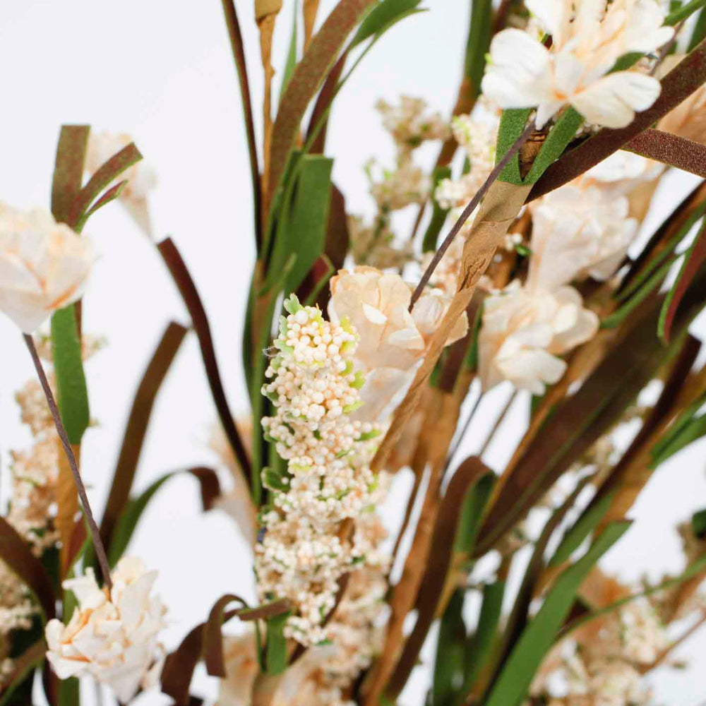 CLOSE UP OF BUDS WITH CREPE PAPER FLOWER