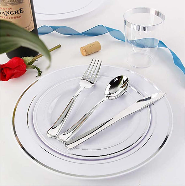 PLASTIC PLATE SET SILVER AND WHITE on white table with decoration