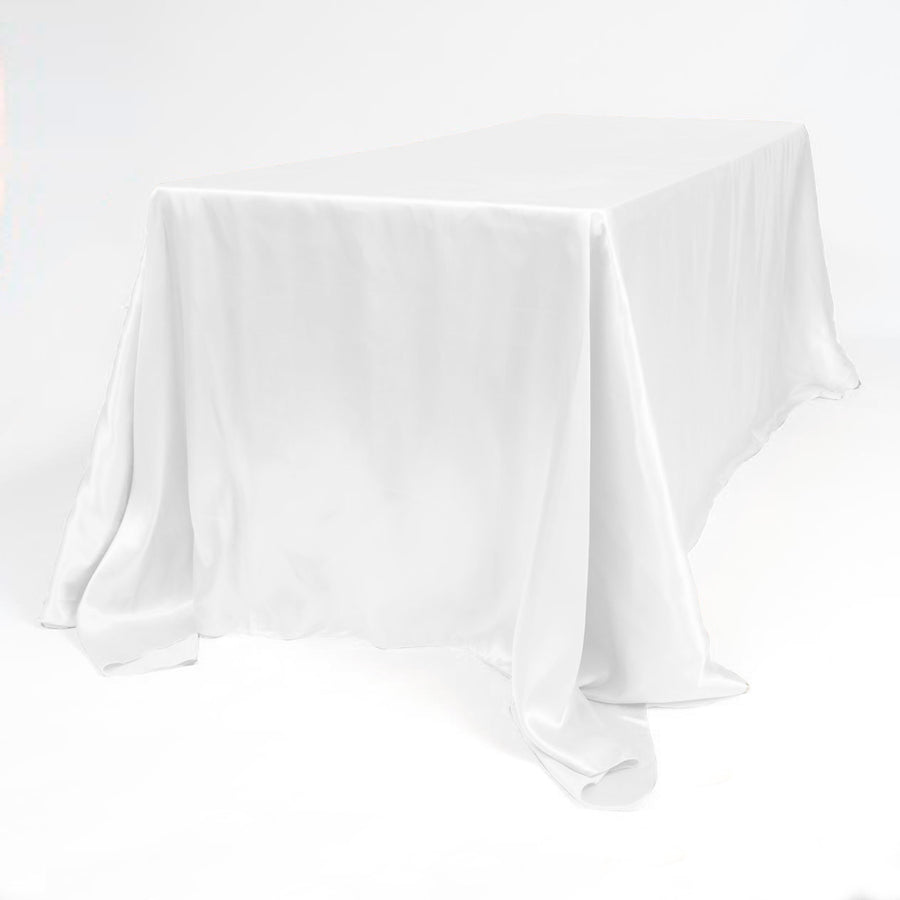 White satin tablelcoth on 6ft trestle table